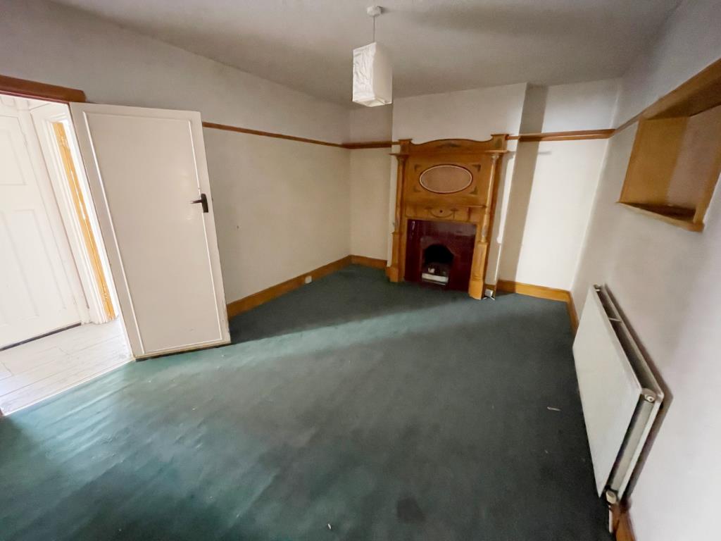 Lot: 11 - FOUR-BEDROOM HOUSE FOR IMPROVEMENT - Rear reception room